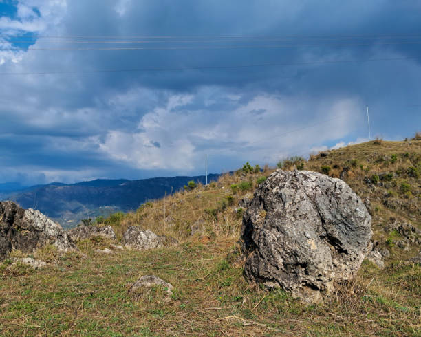 istock Rocky landscape with cloudy sky background 1476968848
