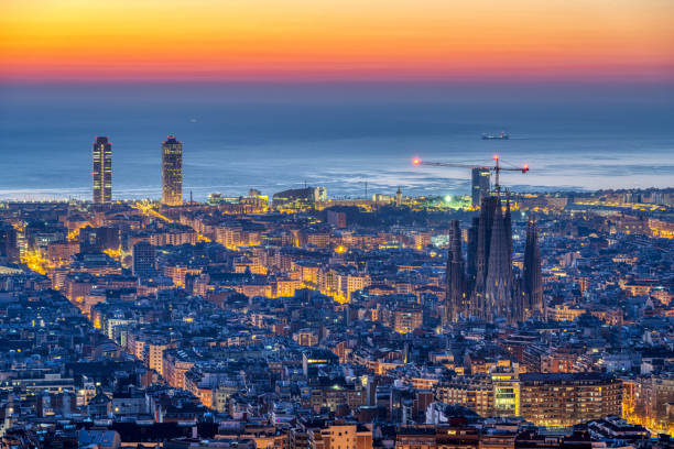 The skyline of Barcelona before sunrise stock photo