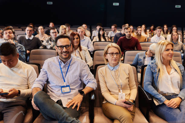 istock Crowd of people attending a seminar in convention center. 1476972121