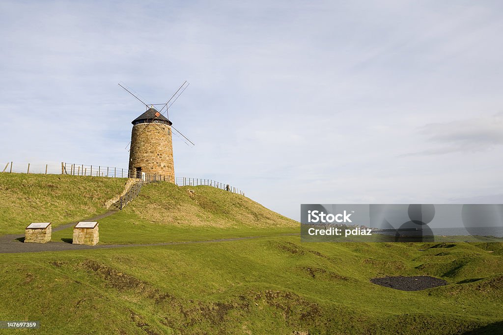 Windmill Traditional windmill in the Scottish coast, near Crail Ancient Stock Photo