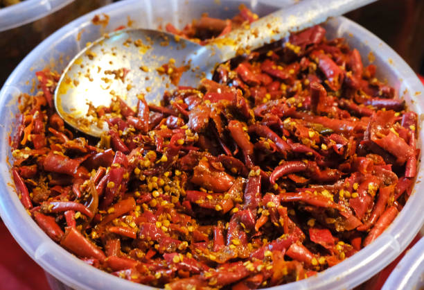 istock Indian home made spicy pickle background, Marinated food. 1476982357