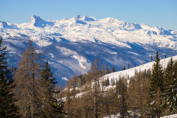 A beautiful winter landscape in the mountains, blue sky, snow