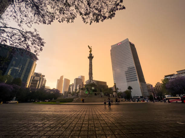 Angel of Independence before the storm stock photo