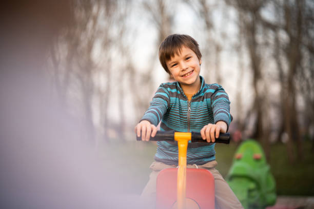A child having fun alone in the playground