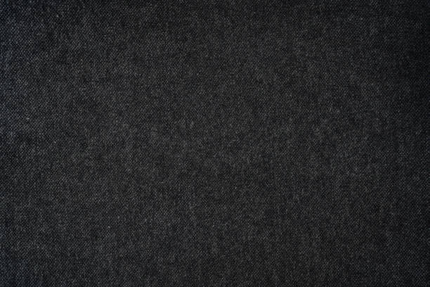 istock Black texture background detail of fabric textile material canvas. 1476990417