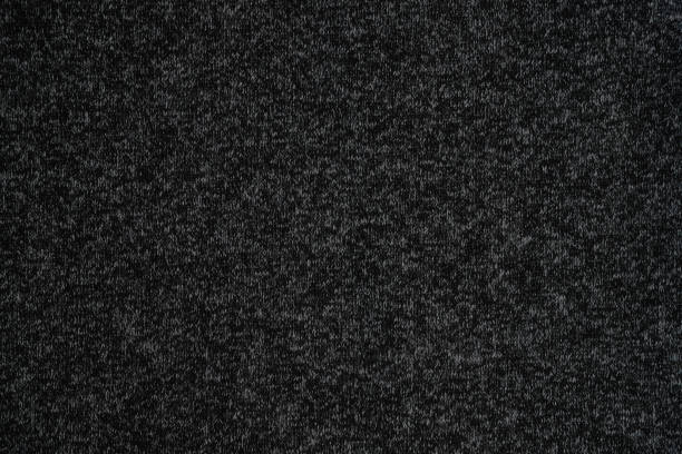 istock Black texture background detail of fabric textile material canvas. 1476991231