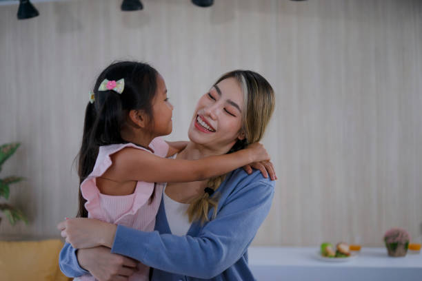 istock Mother do leisure activity with daughter at home. 1476993228