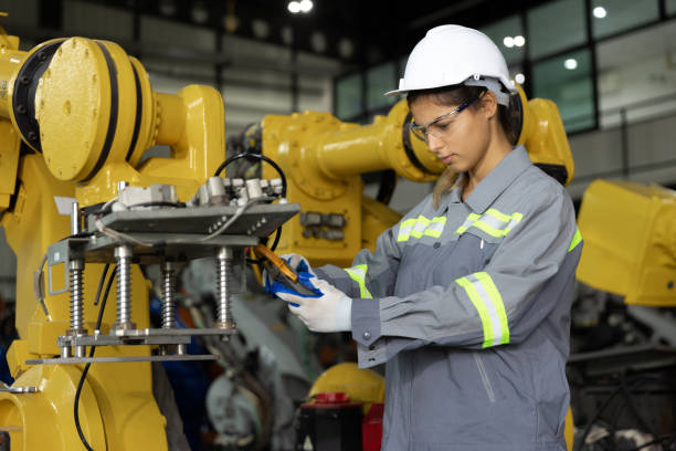 istock Female using multimeter measuring electrical circuit board in factory 1476999246