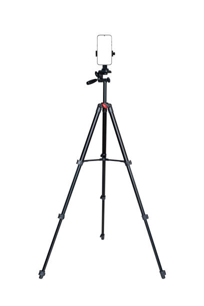 istock Smartphone with blank screen connected to tripod isolated on white background. 1477003674