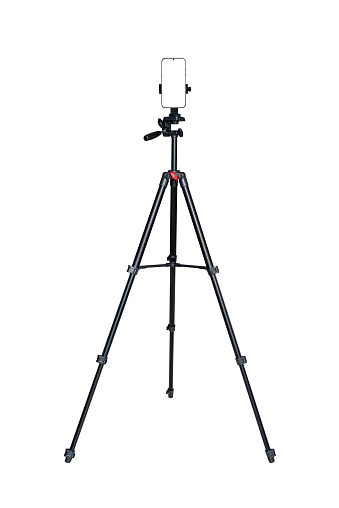 Smartphone with blank screen connected to tripod isolated on white background.