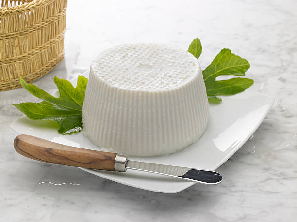 ricotta and fig leaves ricotta is very fresh cheese from cow or sheep milk (it lasts only one day) ricotta photos stock pictures, royalty-free photos & images