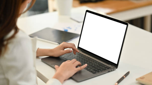 istock Cropped image of female office worker hand typing business email on laptop computer at workplace. 1477012568