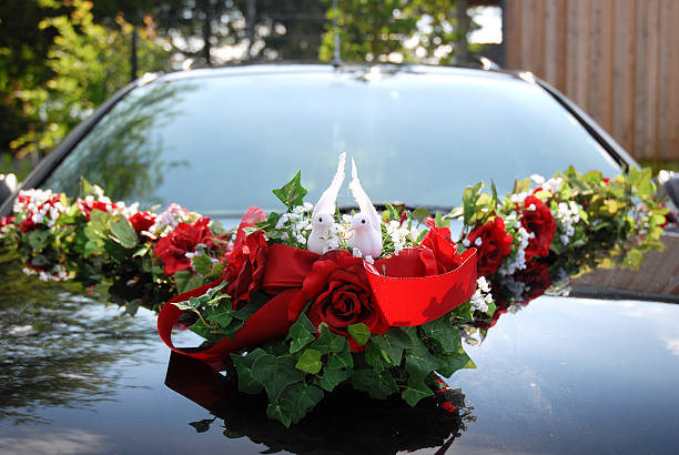 istock Wedding Car Decoration Of Two White Doves Holding Ring 147701596