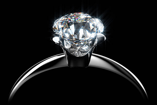 Diamond Ring Glowing Diamond Ring refraction photos stock pictures, royalty-free photos & images