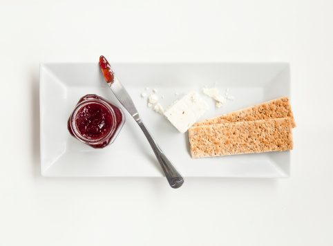 Sesame crackers with cheese and Jam studio shot