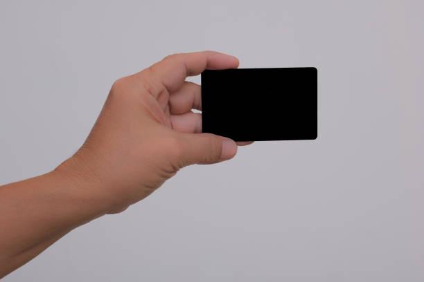 istock A male hand showing a blank card. 1477026727