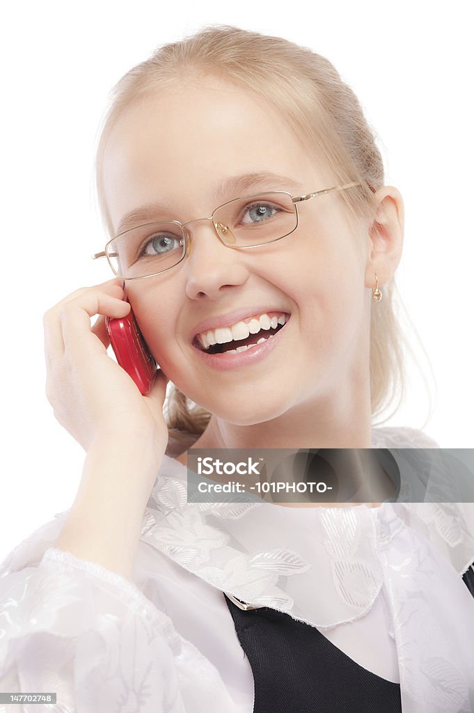 Giovane ragazza chiamate telefoniche - Foto stock royalty-free di Abbigliamento casual