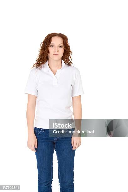 Young Redhead Woman In White Polo Shirt And Jeans Stock Photo - Download Image Now - Polo Shirt, Women, White Color