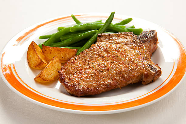 istock Grilled steak with chips green beans 147702966