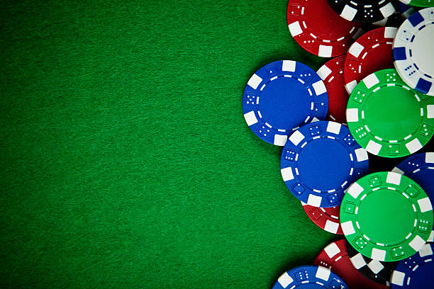istock Selection of gambling chips on a green cloth 147703092