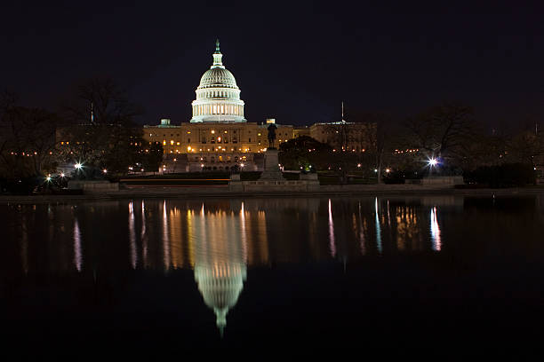 istock The United States Capitol at night 147703351
