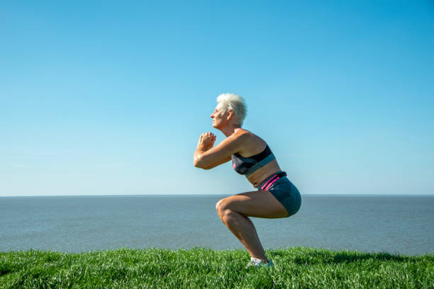 Free Stock Photo of Older woman doing shadow boxing outdoors. Senior ...