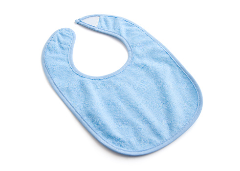 A new blue baby boy's bib, isolated on a white background.