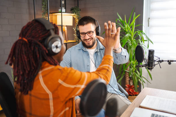 istock Colleagues had a successful working day on the podcast 1477040940