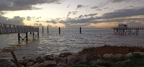 istock a fishing port with the sunset 1477043631