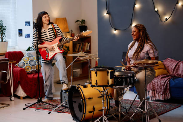 istock Women playing musical instruments in studio 1477049694