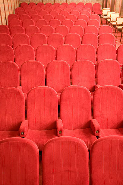 istock red chairs in the empty small cinema auditorium 147705096