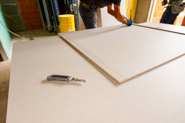 istock Scalpel on the plasterboard in workshop at the construction site 1477052294