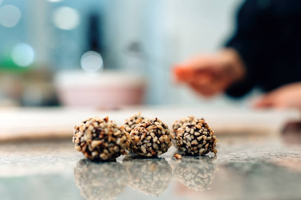 istock belgian pralines on restaurant table kitchen - chocolate in bakery - focus on praline at the right 1477055337