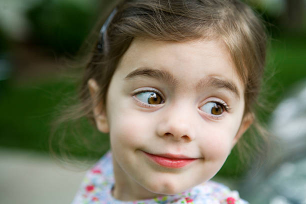 Little Girl Looking Back stock photo