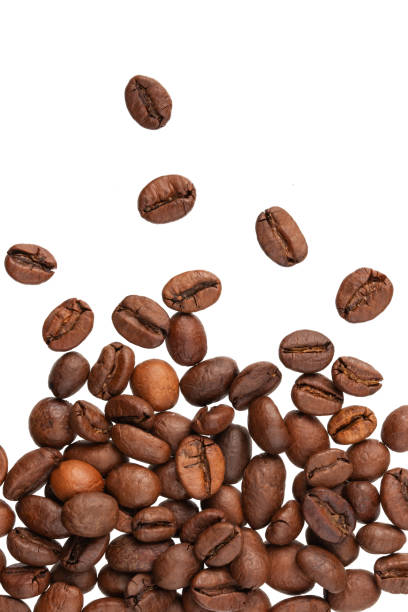 istock roasted whole arabica coffee beans, scattered on paper, isolated 1477067603