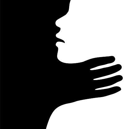 Hand strangling and choking the neck of a victim as abuse, domestic violence, harassment, physical attack or assault concept. Silhouette of a person being strangled, chocked, suffocated.