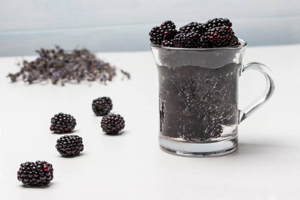 istock Infused berry drink. Blackberries on the table. 1477072965