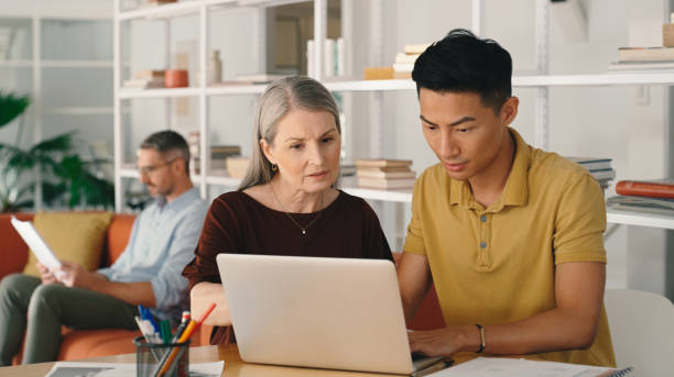 istock Laptop, typing or business people planning a creative digital startup project together with teamwork. Woman, man or workers in collaboration for goals vision, online sales or group marketing strategy 1477076014