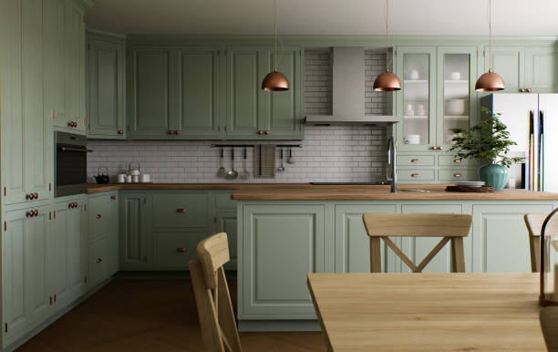 istock Green kitchen interior with island. Stylish kitchen with wooden worktops. Cozy olive kitchen with utensils and appliances. Close-up of a dining table in the background of the kitchen. 3D visualization 1477079070