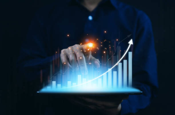 istock Charts, graphs to analyze stocks, trade stocks from a tablet. 1477079466