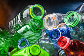 Empty colored drink bottles. Recyclable plastic waste