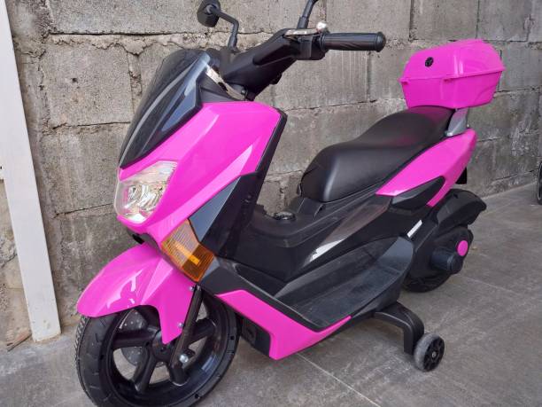 istock Pink Motorized Scooter for Toddlers with Stabilizer Wheels - Safe and Fun Playtime 1477086557