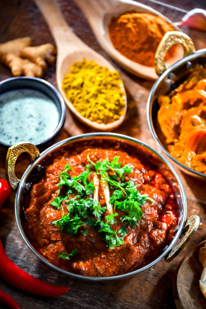 istock Hot madras paneer and vegetable masala with rice 1477086761