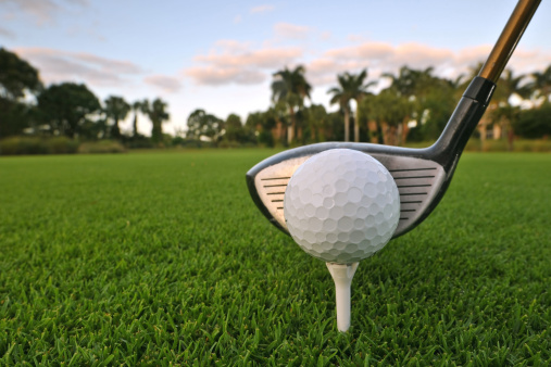Golf ball near edge of cup