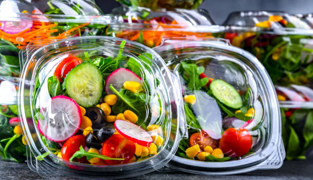 istock Boxes with pre-packaged vegetable salads in a commercial fridge 1477087703