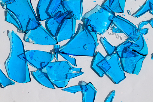 Broken Blue Glass isolated on white background