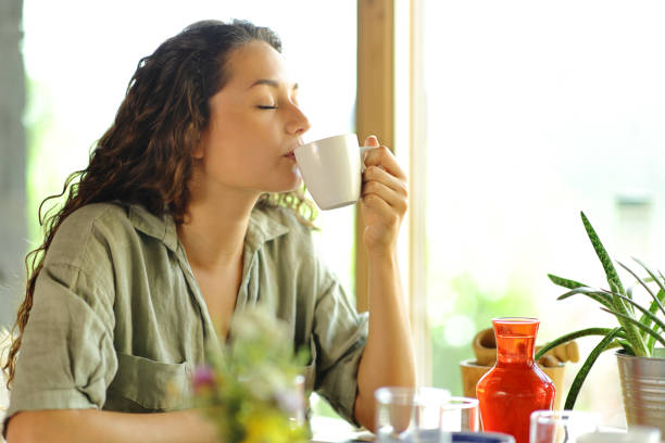 istock Woman drinking coffee in a restaurant 1477088889