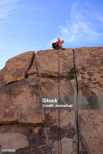 Killer Day To Rappel Stock Photo - Download Image Now - Adult, Cliff, Cloud - Sky