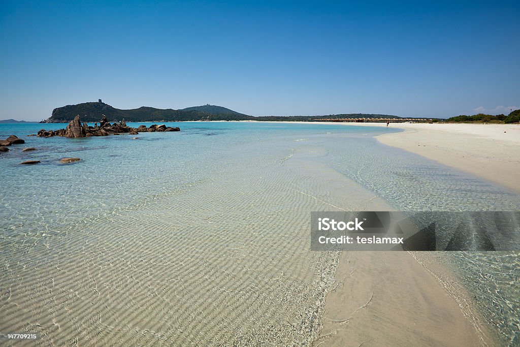 tide games shapes and colors in the clear sea of Sardinia, Italy Villasimius Cliff Stock Photo