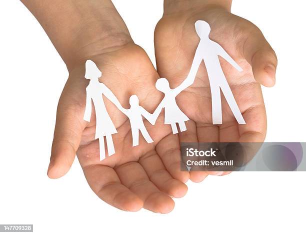 Family In The Childs Hands Stock Photo - Download Image Now - Boys, Child, Concepts